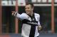 Parma forward Antonio Cassano celebrates after scoring during a Serie A soccer match between AC Milan and Parma, at the San Siro stadium in Milan, Italy, Sunday, March 16, 2014. (AP Photo/Luca Bruno)