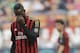 AC Milan forward Mario Balotelli touches his eyes during a Serie A soccer match between AC Milan and Parma, at the San Siro stadium in Milan, Italy, Sunday, March 16, 2014. Parma won 4-2. (AP Photo/Luca Bruno)