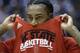 North Carolina State guard Anthony Barber pulls up his jersey during practice for an NCAA college basketball tournament game, Monday, March 17, 2014, in Dayton, Ohio. NC State State plays Xavier on Tuesday in a first round game. (AP Photo/Al Behrman)