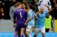 HULL, ENGLAND - MARCH 15: Goalkeeper Joe Hart of Manchester City and George Boyd of Hull City clash following a penalty area incident during the Barclays Premier league match between Hull City and Manchester City at KC Stadium on March 15, 2014 in Hull, England. (Photo by Paul Thomas/Getty Images)