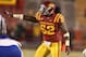 Iowa State linebacker Jeremiah George (52) gives directions to another Iowa State defensive player during the second half of an NCAA college football game against Kansas in Ames, Iowa, Saturday, Nov. 23, 2013. Iowa State won 34-0. (AP Photo/Justin Hayworth)