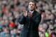 LIVERPOOL, ENGLAND - FEBRUARY 08: Liverpool Manager Brendan Rodgers applauds during the Barclays Premier League match between Liverpool and Arsenal at Anfield on February 8, 2014 in Liverpool, England. (Photo by Michael Regan/Getty Images)