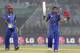 Afghanistan cricketers Shafiqullah, right and captain Mohammad Nabi celebrate their victory over Hong Kong during their ICC Twenty20 Cricket World Cup match in Chittagong, Bangladesh, Tuesday, March 18, 2014. Afghanistan won by seven wickets.(AP Photo/Bikas Das)