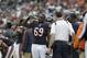 Chicago Bears defensive tackle Henry Melton (69) takes a drink on the sidelines in the first half of an NFL football game against the Seattle Seahawks in Chicago, Sunday, Dec. 2, 2012. (AP Photo/Nam Y. Huh)