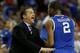 ATLANTA, GA - MARCH 16: Head coach John Calipari of the Kentucky Wildcats talks to Aaron Harrison #2 in the first half against the Florida Gators during the Championship game of the 2014 Men's SEC Basketball Tournament at Georgia Dome on March 16, 2014 in Atlanta, Georgia. (Photo by Kevin C. Cox/Getty Images)