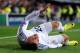 MADRID, SPAIN - MARCH 18: Jese of Real Madrid goes down under a heavy tackle from Sead Kolasinac of Schalke during the UEFA Champions League Round of 16, second leg match between Real Madrid and FC Schalke 04 at Estadio Santiago Bernabeu on March 18, 2014 in Madrid, Spain. (Photo by Denis Doyle/Getty Images)