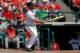 LAKE BUENA VISTA, FL - MARCH 15: Evan Gattis #24 of the Atlanta Braves hits a fly ball in the fourth inning of a game against the St. Louis Cardinals at Champion Stadium on March 15, 2014 in Lake Buena Vista, Florida. St. Louis won the game 6-2. (Photo by Stacy Revere/Getty Images)