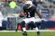 Nov 2, 2013; University Park, PA, USA; Penn State Nittany Lions running back Bill Belton (1) during the second quarter against the Illinois Fighting Illini at Beaver Stadium. Mandatory Credit: Matthew O'Haren-USA TODAY Sports