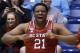 North Carolina State forward Beejay Anya celebrates on the bench in the closing seconds of the team's 74-59 win over Xavier in a first-round game of the NCAA college basketball tournament, Tuesday, March 18, 2014, in Dayton, Ohio. (AP Photo/Al Behrman)