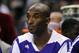 Dec 14, 2013; Charlotte, NC, USA; Los Angeles Lakers guard Kobe Bryant (24) watches his team from the bench during the first half of the game against the Los Angeles Lakers at Time Warner Cable Arena. Mandatory Credit: Sam Sharpe-USA TODAY Sports