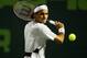 MIAMI - MARCH 28: Roger Federer of Switzerland returns a shot against Rafael Nadal of Spain on March 28, 2004 during Nasdaq 100 Open at the Crandon Park Tennis Center on Key Biscayne in Miami, Florida. (Photo by Ezra Shaw/Getty Images)