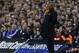 Galatasaray's head coach Roberto Mancini watches his side from the technical area during the Champions League last 16 second leg soccer match between Chelsea and Galatasaray at Stamford Bridge stadium in London, Tuesday, March 18, 2014. (AP Photo/Matt Dunham)