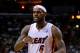 MIAMI, FL - MARCH 12: LeBron James #6 of the Miami Heat reacts to a play during a game against the Brooklyn Nets at American Airlines Arena on March 12, 2014 in Miami, Florida. NOTE TO USER: User expressly acknowledges and agrees that, by downloading and/or using this photograph, user is consenting to the terms and conditions of the Getty Images License Agreement. Mandatory copyright notice: (Photo by Mike Ehrmann/Getty Images)