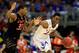 KANSAS CITY, MO - MARCH 13: Andrew Wiggins #22 of the Kansas Jayhawks drives upcourt as Marcus Smart #33 of the Oklahoma State Cowboys defends during the Big 12 Basketball Tournament quarterfinal game at Sprint Center on March 13, 2014 in Kansas City, Missouri. (Photo by Jamie Squire/Getty Images)