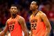 LAWRENCE, KS - JANUARY 18: Marcus Smart #33 and Markel Brown #22 of the Oklahoma State Cowboys walk off the court during a timeout in the game against the Kansas Jayhawks at Allen Fieldhouse on January 18, 2014 in Lawrence, Kansas. (Photo by Jamie Squire/Getty Images)
