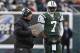 EAST RUTHERFORD, NJ - DECEMBER 8: Geno Smith #7 of the New York Jets talks to offensive coordinator Marty Mornhinweg during their game against the Oakland Raiders at MetLife Stadium on December 8, 2013 in East Rutherford, New Jersey. (Photo by Jeff Zelevansky/Getty Images)