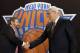 New York Knicks new team president Phil Jackson, right, shakes hands with Madison Square Garden Chairman James Dolan during a news conference where he was introduced, at New York's Madison Square Garden, Tuesday, March 18, 2014. (AP Photo/Richard Drew)
