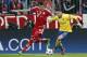 Bayern's Mario Mandzukic, left, and Arsenal's Mesut Ozil challenge for the ball during the Champions League round of 16 second leg soccer match between FC Bayern Munich and FC Arsenal in Munich, Germany, Tuesday, March 11, 2014. (AP Photo/Matthias Schrader)