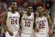 North Carolina State players, from left, T.J. Warren (24), Lennard Freeman (10), and Ralston Turner (22), celebrate during the second half of a second round NCAA college basketball game against Miami at the Atlantic Coast Conference tournament in Greensboro, N.C., Thursday, March 13, 2014. North Carolina State won 67-58. (AP Photo/Gerry Broome)