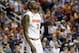 Syracuse's Jerami Grant (3) walks off the court after their loss to North Carolina State in a quarterfinal NCAA college basketball game at the Atlantic Coast Conference tournament in Greensboro, N.C., Friday, March 14, 2014. North Carolina State won 66-63. (AP Photo/Gerry Broome)