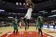 Oklahoma City Thunder forward Kevin Durant (35) dunks between Chicago Bulls guard Jimmy Butler (21) and Joakim Noah (13) during the second half of an NBA basketball game Monday, March 17, 2014, in Chicago. The Thunder won the game 97-85. (AP Photo/Jeff Haynes)