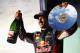 MELBOURNE, AUSTRALIA - MARCH 16: Daniel Ricciardo of Australia and Infiniti Red Bull Racing celebrates on the podium after finishing second during the Australian Formula One Grand Prix at Albert Park on March 16, 2014 in Melbourne, Australia. (Photo by Mark Thompson/Getty Images)