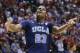 UCLA's Tony Parker motions to fans in the second half against Arizona during the championship game of the NCAA Pac-12 conference college basketball tournament, Saturday, March 15, 2014, in Las Vegas. (AP Photo/Julie Jacobson)