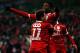 LIEGE, BELGIUM - JANUARY 25: Michy Batshuayi of Standard is congratulated by team mate Maor Buzaglo after he scores a goal during the Jupiler League match between Standard de Liege and KV Kortrijk at Stade Maurice Dufrasne the on January 25, 2013 in Liege, Belgium. (Photo by Dean Mouhtaropoulos/Getty Images)