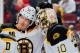 NEWARK, NJ - MARCH 18: Winning goaltender Chad Johnson #30 of the Boston Bruins is congratulated by Loui Eriksson #21 after defeating the New Jersey Devils at the Prudential Center on March 18, 2014 in Newark, New Jersey. The Bruins defeated the Devils 4-2. (Photo by Andy Marlin/NHLI via Getty Images)