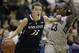 Penn State’s Maggie Lucas (33) moves the ball on Georgetown’s Samisha Powell (23) during the first half of an NCAA college basketball game on Sunday, Dec. 8, 2013, in Washington. (AP Photo/Luis M. Alvarez)