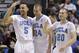 From left to right, UCLA's Kyle Anderson, Travis Wear and Bryce Alford react after a basket by Wear in the second half of an NCAA Pac-12 conference tournament quarterfinal college basketball game against Oregon, Thursday, March 13, 2014, in Las Vegas. UCLA won 82-63. (AP Photo/Julie Jacobson)