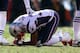 DENVER, CO - JANUARY 19: Aqib Talib #31 of the New England Patriots kneels over on the ground after colliding with Wes Welker #83 of the Denver Broncos during the AFC Championship game at Sports Authority Field at Mile High on January 19, 2014 in Denver, Colorado. (Photo by Doug Pensinger/Getty Images)