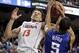 Virginia's Anthony Gill (13) and Duke's Rodney Hood (5) battle for a rebound during the second half of an NCAA college basketball game in the championship of the Atlantic Coast Conference tournament in Greensboro, N.C., Sunday, March 16, 2014. (AP Photo/Bob Leverone)