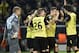 Dortmund's Sebastian Kehl, second right, celebrates scoring his side's first goal with his teammates during the UEFA Champions League last 16 second leg soccer match between Borussia Dortmund and FC Zenit in Dortmund, Germany, Wednesday, March 19, 2014. (AP Photo/Martin Meissner)