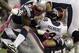 New England Patriots defensive end Chandler Jones (95) and defensive end Rob Ninkovich (50) sack Denver Broncos quarterback Peyton Manning (18) to cause a fumble in the third quarter of an NFL football game, Sunday, Oct. 7, 2012, in Foxborough, Mass. (AP Photo/Stephan Savoia)