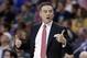 Louisville coach Rick Pitino calls for a jump ball during the first half of an NCAA college basketball game against Connecticut in the finals of the American Athletic Conference men's tournament Saturday, March 15, 2014, in Memphis, Tenn. (AP Photo/Mark Humphrey)