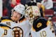 NEWARK, NJ - MARCH 18: Winning goaltender Chad Johnson #30 of the Boston Bruins is congratulated by Loui Eriksson #21 after defeating the New Jersey Devils at the Prudential Center on March 18, 2014 in Newark, New Jersey. The Bruins defeated the Devils 4-2. (Photo by Andy Marlin/NHLI via Getty Images)