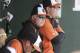 Baltimore Orioles manager Buck Showalter is seen in the dugout during a spring exhibition baseball game against the New York Yankees in Sarasota, Fla., Saturday, March 15, 2014. (AP Photo/Carlos Osorio)