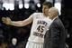 Saint Joseph's Halil Kanacevic, left, talks with head coach Phil Martelli during the second half of an NCAA college basketball game against St. Bonaventure in the semifinal round of the Atlantic 10 Conference tournament at the Barclays Center in New York, Saturday, March 15, 2014. Saint Joseph's defeated St. Bonaventure 67-48. (AP Photo/Seth Wenig)