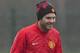 Manchester United's Juan Mata trains with teammates at Carrington training ground in Manchester, Tuesday, March 18, 2014. Manchester United will play Olympiakos in a Champions League last 16 second leg soccer match on Wednesday. (AP Photo/Jon Super)