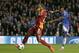 Chelsea's Samuel Eto'o, right, shoots and scores the opening goal during the Champions League last 16 second leg soccer match between Chelsea and Galatasaray at Stamford Bridge stadium in London, Tuesday, March 18, 2014. (AP Photo/Matt Dunham)
