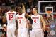 Feb 22, 2014; Columbus, OH, USA; Ohio State Buckeyes Sam Thompson (12) Shannon Scott (3) and Aaron Craft (4) celebrate after an alleyoop play during the second half of the game against the Minnesota Golden Gophers at Schottenstein Center. Mandatory Credit: Rob Leifheit-USA TODAY Sports