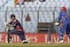 Nepal's Subash Khakurel plays a shot as Afghanistan's wicketkeeper Mohammad Shahzad, right, watches during their ICC Twenty20 Cricket World Cup match in Chittagong, Bangladesh, Thursday, March 20, 2014 . (AP Photo/Bikas Das)