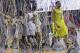 Michigan guard Trey Burke (3) walks off the court as Louisville celebrates their win after the second half of the NCAA Final Four tournament college basketball championship game Monday, April 8, 2013, in Atlanta. Louisville won 82-76. (AP Photo/Charlie Neibergall)