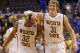 Wichita State's Ron Baker (31) and Tekele Cotton (32) celebrate late in the second half of an NCAA college basketball game against Indiana State for the championship of the Missouri Valley Conference Sunday, March 9, 2014, in St. Louis. (AP Photo/Bill Boyce)