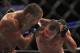 Mauricio Rua, right, fights Dan Henderson during a UFC 139 Mixed Martial Arts light heavyweight bout in San Jose, Calif., Saturday, Nov. 19, 2011. (AP Photo/Jeff Chiu)