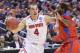 Mar 20, 2014; Buffalo, NY, USA;Ohio State Buckeyes guard Aaron Craft (4) drives to the basket against Ohio State Buckeyes in the second half of a men's college basketball game during the second round of the 2014 NCAA Tournament at First Niagara Center. Mandatory Credit: Mark Konezny-USA TODAY Sports