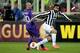 FLORENCE, ITALY - MARCH 20: Borja Valero of ACF Fiorentina fights for the ball with Andrea Pirlo of Juventus during the UEFA Europa League Round of 16 match between ACF Fiorentina and Juventus at Stadio Artemio Franchi on March 20, 2014 in Florence, Italy. (Photo by Gabriele Maltinti/Getty Images)