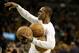Boston Celtics point guard Rajon Rondo (9) holds three balls aqs he takes practice shots before the first half of their NBA basketball game against the Dallas Mavericks in Boston, Sunday, Feb. 9, 2014. The Mavericks defeated the Celtics 102-91. (AP Photo/Stephan Savoia)