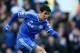 Chelsea's Oscar takes a shot at goal during the English Premier League soccer match between Chelsea and Newcastle United in London Saturday, Feb 8, 2014. (AP Photo/Alastair Grant)